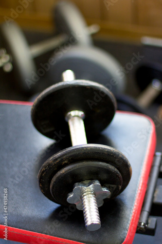 Close-up shot of some dumbbells' in a gym. 