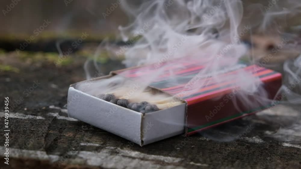 open box of matches burning in slow motion open box of matches burning in slow motion