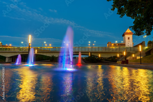 Multi-colored fountain on the promenade by the Narva River.