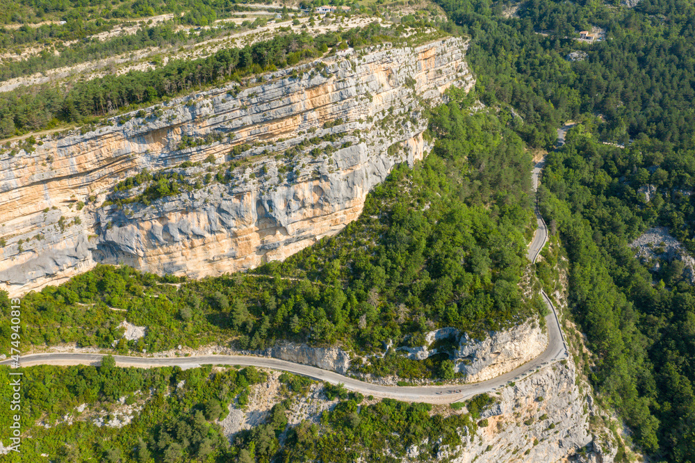 A road crosses the Gorges du Verdon in Europe, France, Provence Alpes Cote dAzur, Var, in summer, on a sunny day.