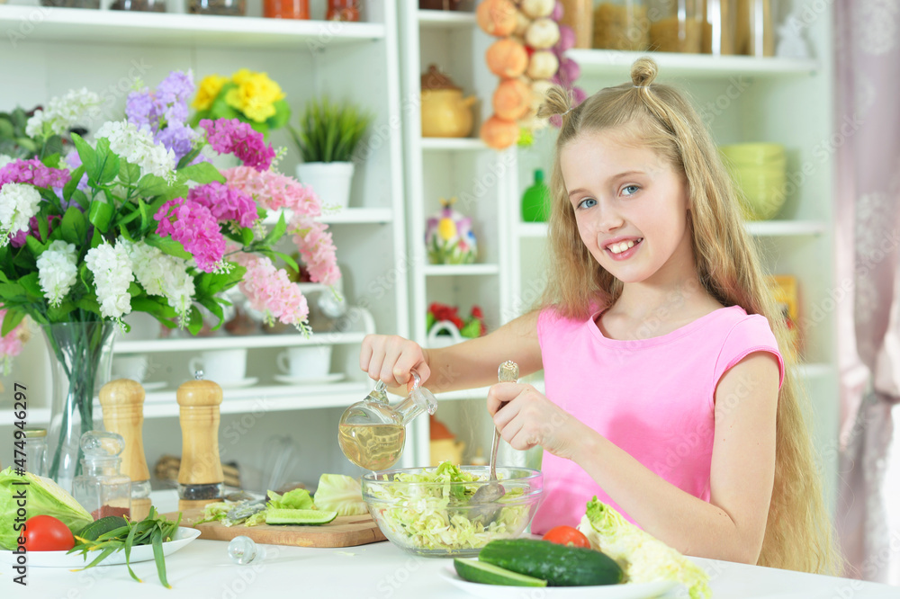 Cute girl preparing delicious fresh salad Cute girl preparing delicious fresh salad