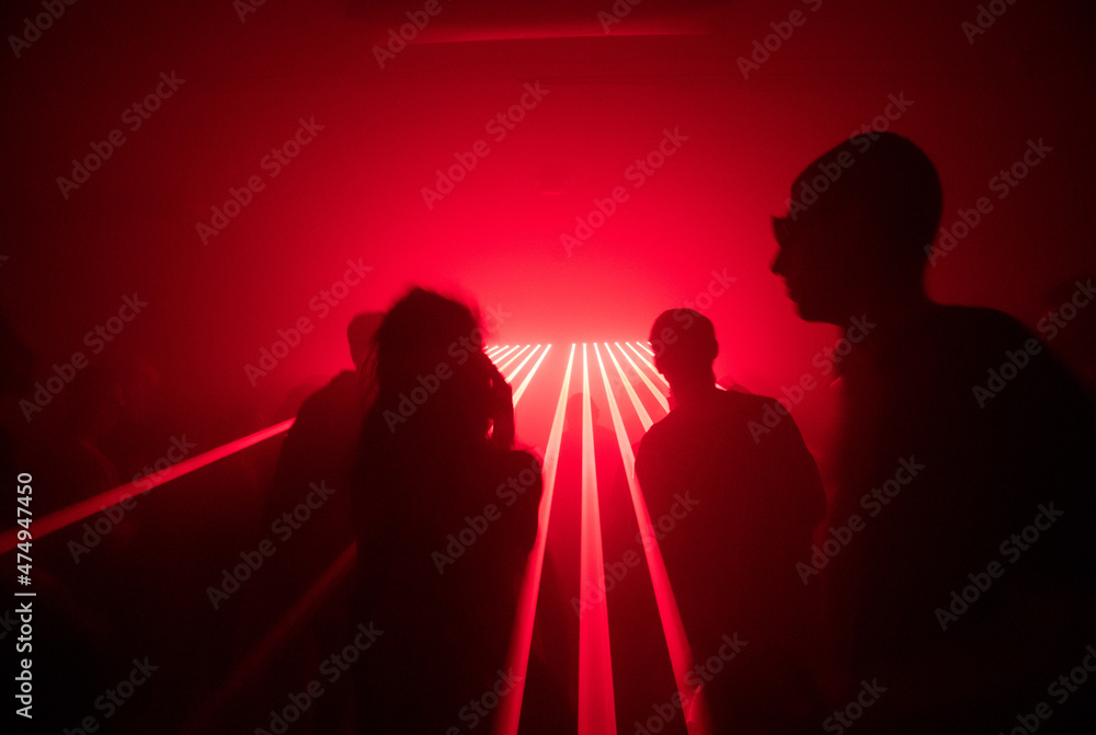 techno rave visual light red lazers geometric people dance dj sexual wild atmosphere acid festival party