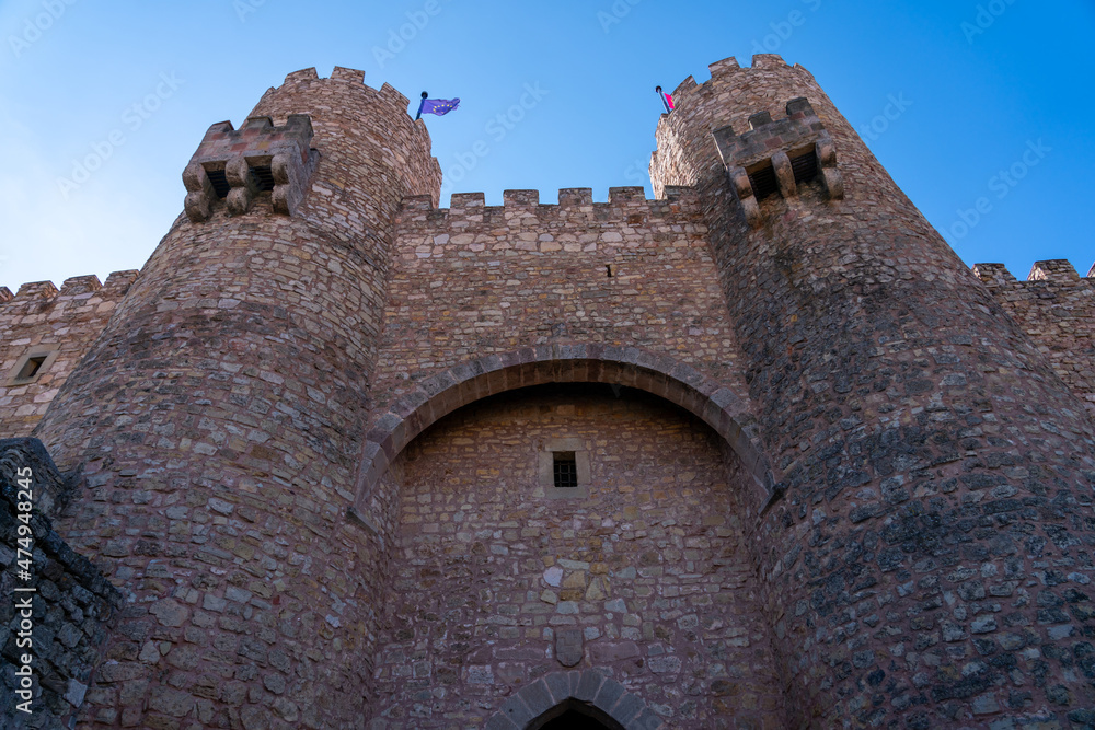 Wide Angle View of Two Rock Tower On External Wall of Spanish Castle