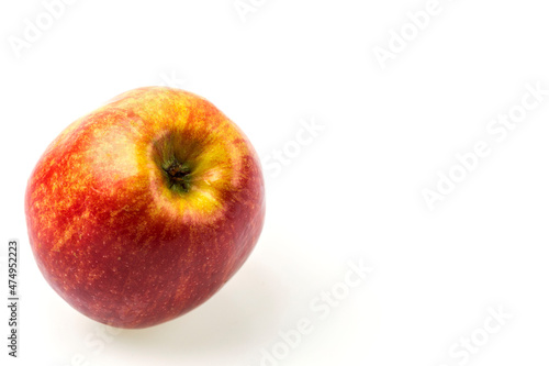 Beautiful macro view of red apple isolated on white background.  © Alex