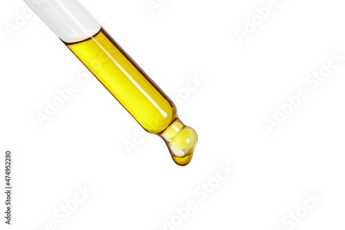 Pipette with essential oil isolated on white background. 