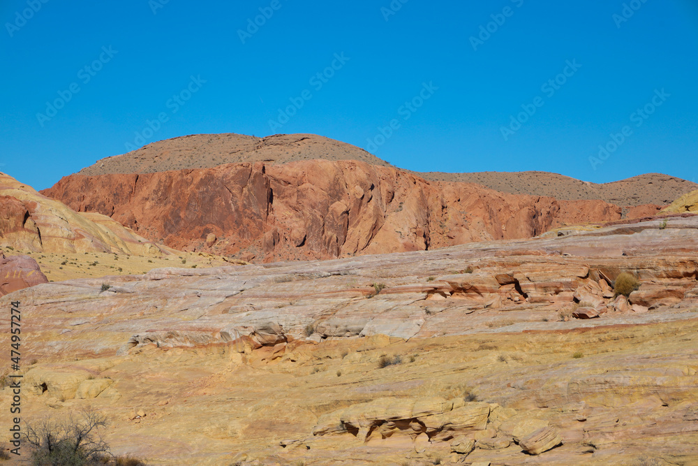 Fototapeta premium Valley of Fire State Park is a public recreation and nature preservation area covering nearly 46,000 acres located 16 miles south of Overton, Nevada. The state park derives its name from red sandstone