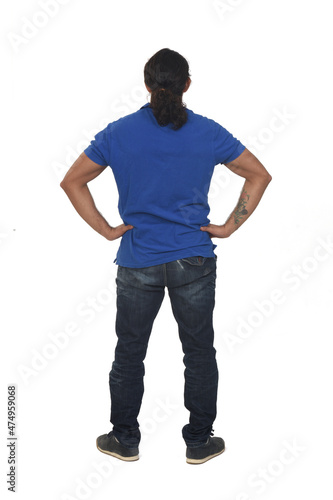 rear view of a man hands on hip on white background