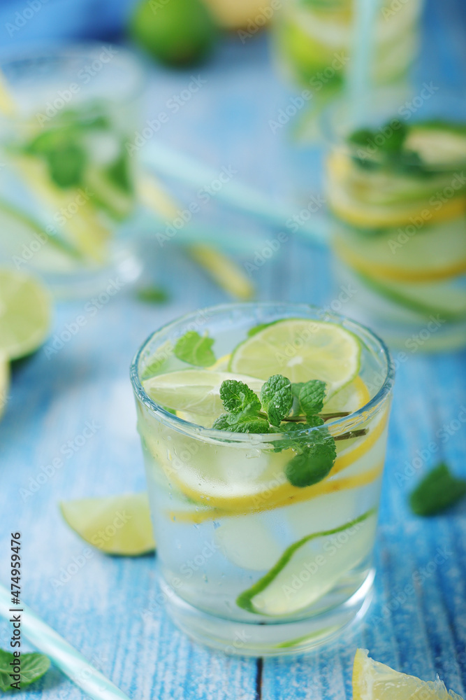 Fototapeta premium Glasses with lemon and lime lemonade 