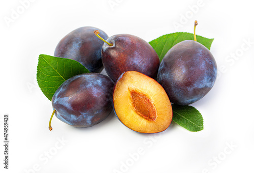 fresh plum fruits with green leaf