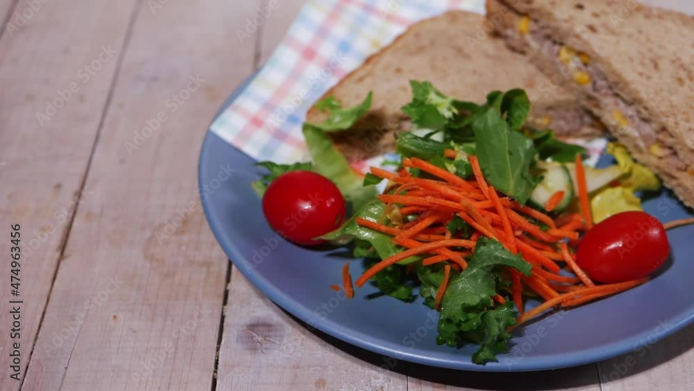 Tuna sandwich with fresh healthy salad Tuna sandwich with fresh healthy salad