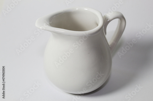 White ceramic milk jug with vintage design