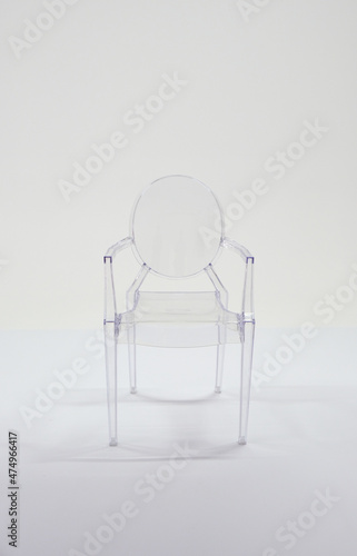 transparent plastic chair on white background