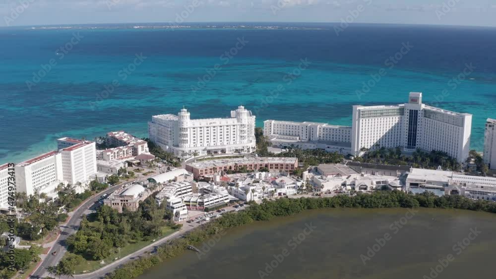 4K Drone view of Cancun hotel zone. Big hotel complex in zona hotelera between lagoon and sea. 4K Drone view of Cancun hotel zone. Big hotel complex in zona hotelera between lagoon and sea.