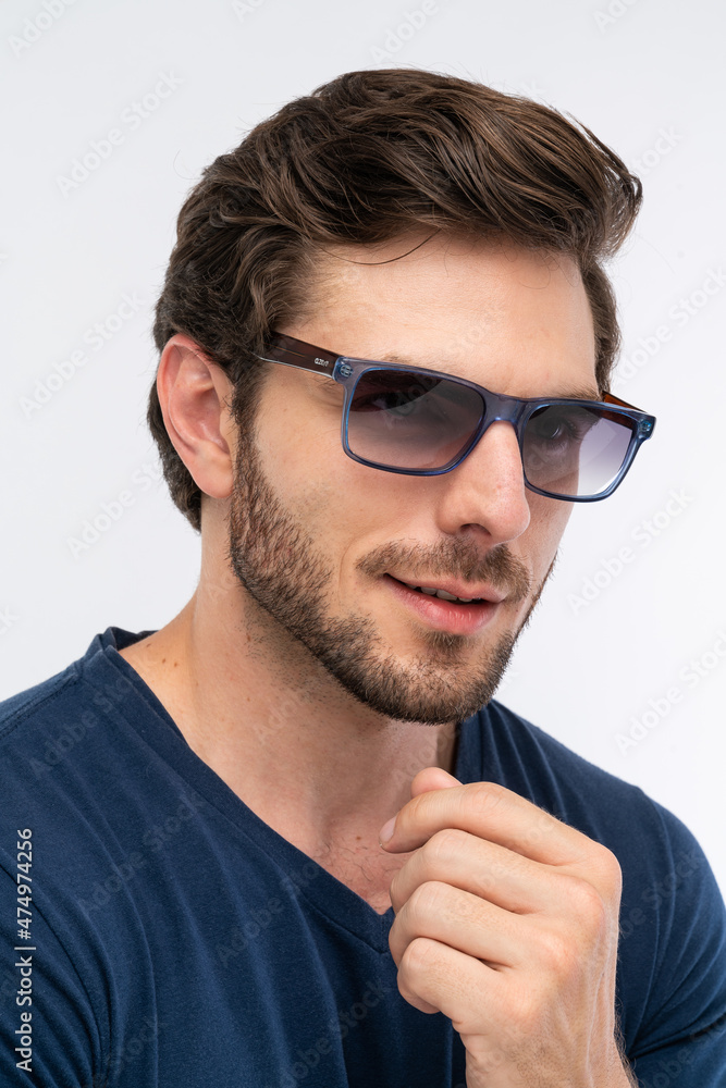 portrait of a man, with sunglasses, studio shot portrait of a man, with sunglasses, studio shot