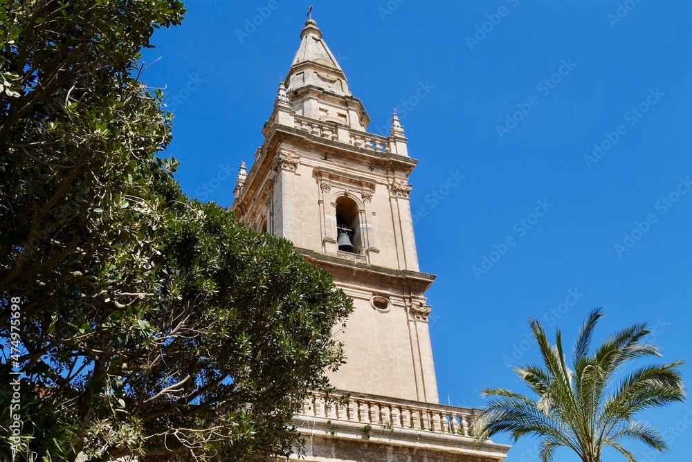 Church tower of Cattedrale di San Giovanni Battista (St. John Cathedral) in Baroque town Ragusa, Sicily, Italy.