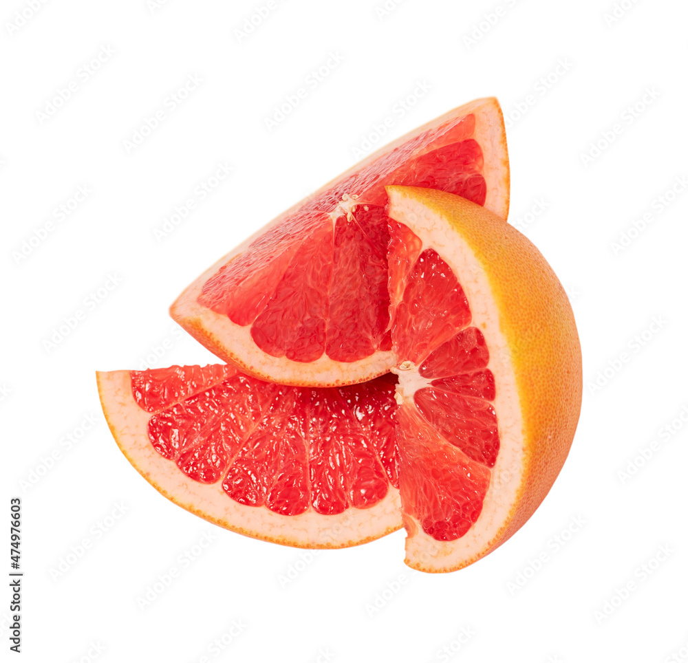 Three pieces of grapefruit close-up isolated on a white background. Three pieces of grapefruit close-up isolated on a white background.