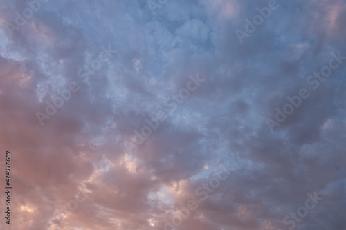 abstract background of dramatic cloudy sunset sky blue hour