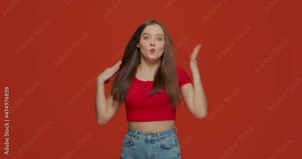 Amazed happy young modern girl screaming wow shocked by unbelievable good news, victory, big sale discount Amazed happy young modern girl screaming wow shocked by unbelievable good news, victory, big sale discount