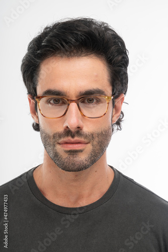 man with glasses, studio shot. © w10