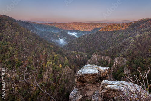 Blick von der Rosstrappe bei Thale im Harz in das Bodetal zum Sonnenaufgang photo