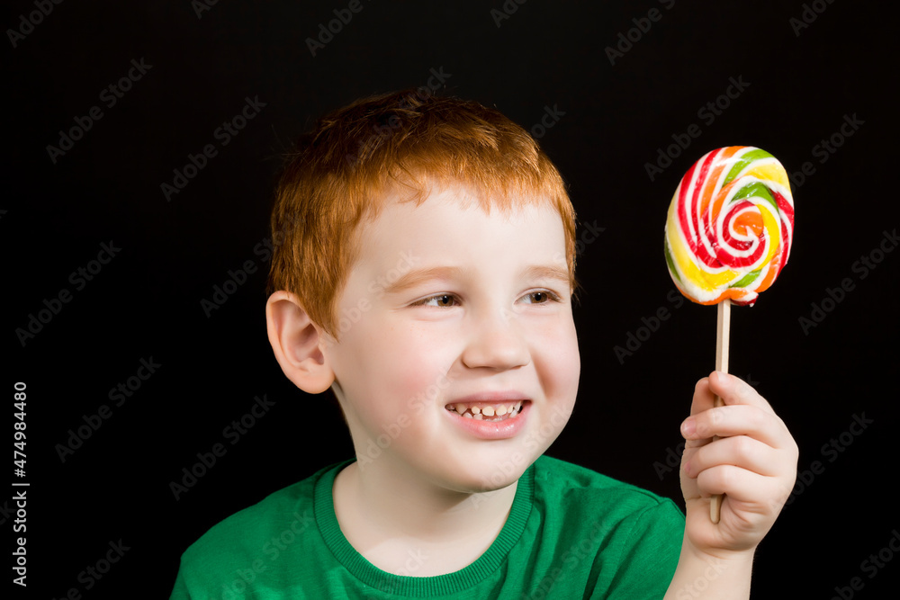 boy with a Lollipop made of sugar