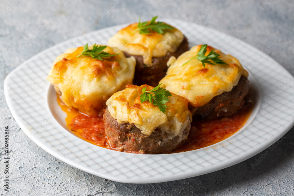 Turkish Food Hasanpasa Kofte - Kofta with Puree - Meatball with Bechamel Sauce and Green Peas. Traditional Food. Turkish Food Hasanpasa Kofte - Kofta with Puree - Meatball with Bechamel Sauce and Green Peas. Traditional Food.