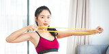 young woman doing exercise at home, fitness sport for body building and training, active happy girl