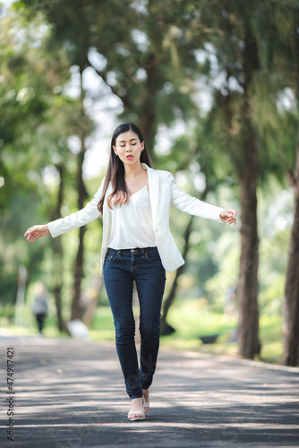 young Asian business woman ...