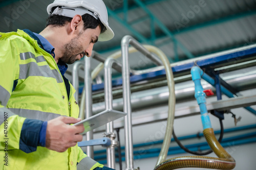 technician inspection engineer working to maintenance a construction equipment industry © chokniti