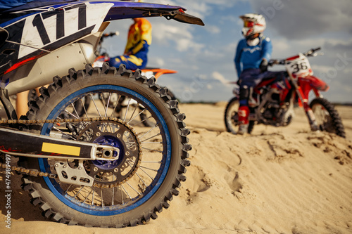 Fototapeta Naklejka Na Ścianę i Meble -  Motocross driver on extreme desert terrain track