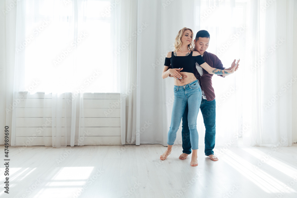 woman and man dancing to bachata music woman and man dancing to bachata music
