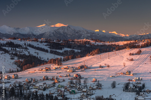 Fototapeta Naklejka Na Ścianę i Meble -  A beautiful winter morning with a view of the High Tatras. The snow created an amazing atmosphere in the photo.