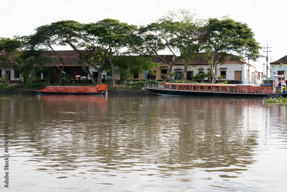 Boats docked in the bank of the Magdalena River Boats docked in the bank of the Magdalena River