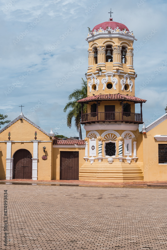 Obraz premium Mompox, Colombia - August 14, 2021: The Santa Barbara church at morning in the colonial village of Mompox.