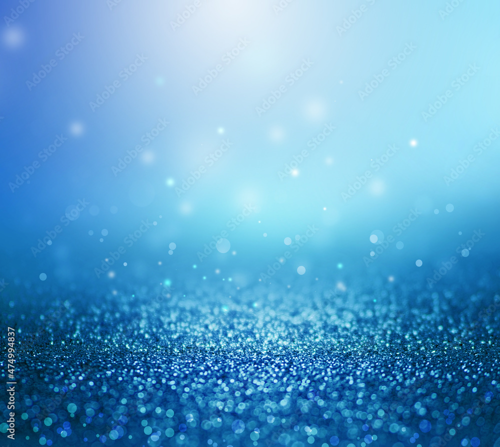 blue abstract bokeh glitter background for Christmas and Valentine.