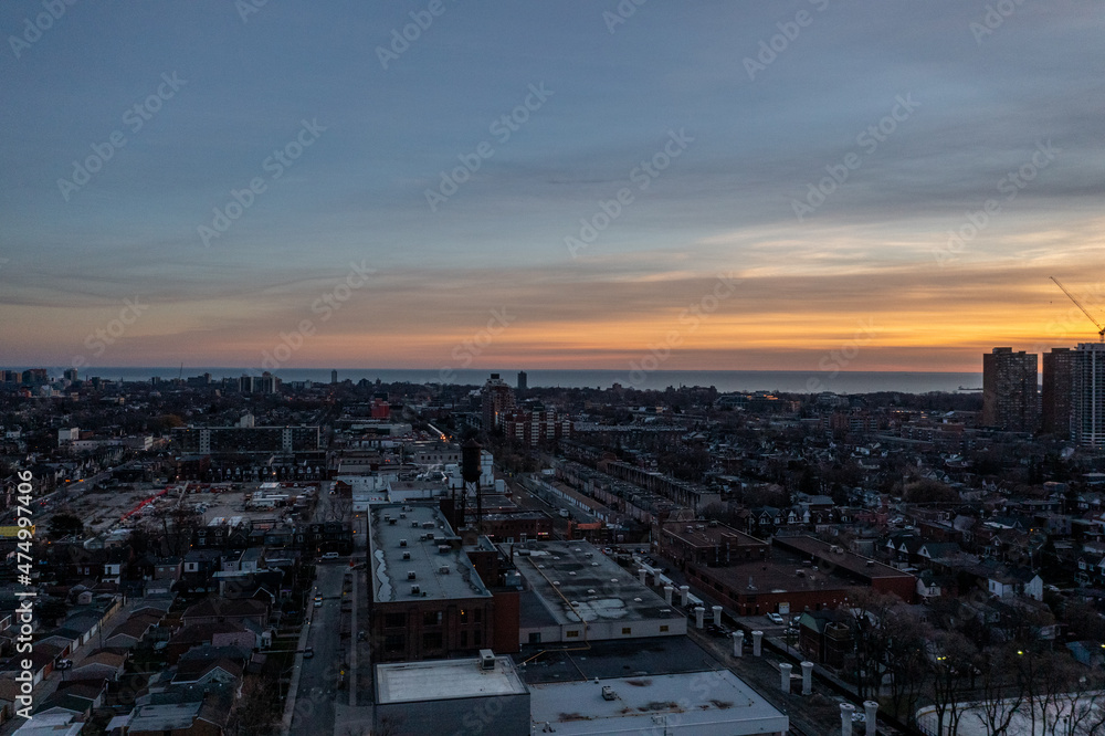 downtown Toronto skyline  sunset drone view  in December  with downtown houses and buildings 