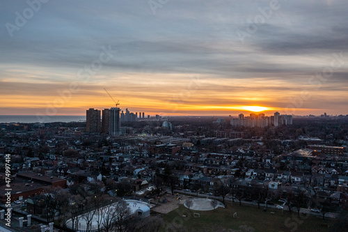 downtown Toronto skyline sunset drone view in December with downtown houses and buildings 