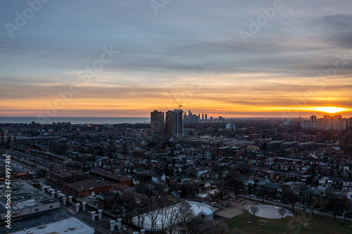 downtown Toronto skyline sunset drone view in December with downtown houses and buildings 