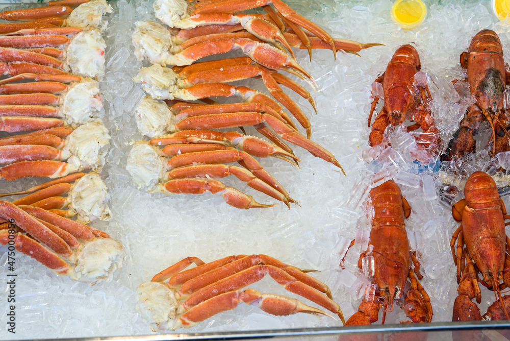 Fresh crab legs on the seafood market counter