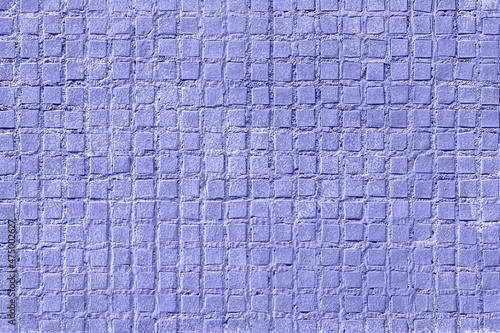Purple textured tiled wall background, very peri color of the year 2022
