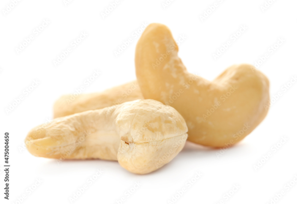 Pile of tasty organic cashew nuts isolated on white Pile of tasty organic cashew nuts isolated on white