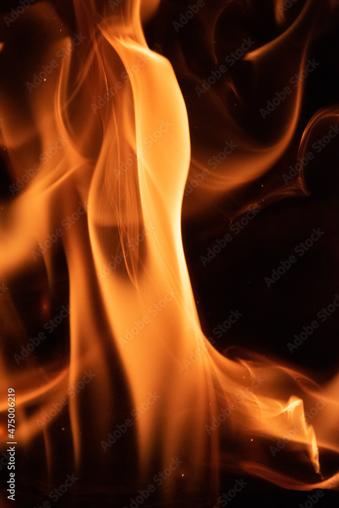 Fire flames on black background. lights on a black background. Fire flames on black background. lights on a black background.