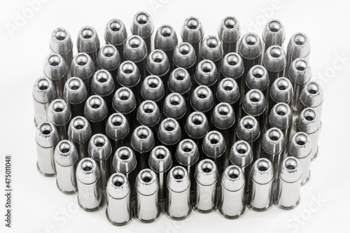 Close up view of 38 caliber hollow point bullets with white background. 