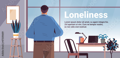 sad man depressed guy standing in front of window loneliness and isolation depressive disorder problem mental health diseases