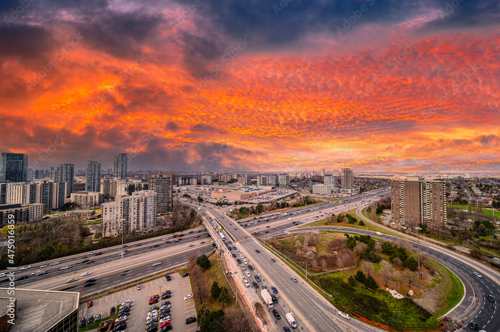 drone sunset  photo in don mills area overlooking the don valley parkway with  orange-red clouds 