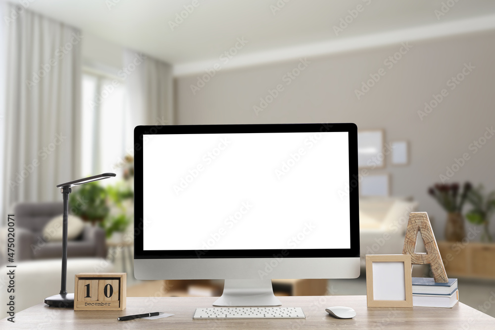 Workplace with modern computer on wooden table indoors. Mockup for design Workplace with modern computer on wooden table indoors. Mockup for design