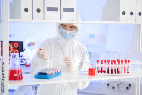 Scientist working with samp...