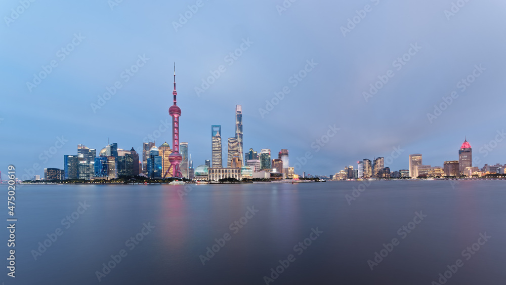 Cityscape of Shanghai at evening. Panoramic view of Pudong's skyline from the Bund. Located in Waitan. One of the most famous tourist destinations in Shanghai.