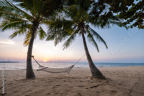 NaJomtien Pattaya Thailand, Hammock on the beach during sunset with palm trees. Na Jomtien Pattaya photo