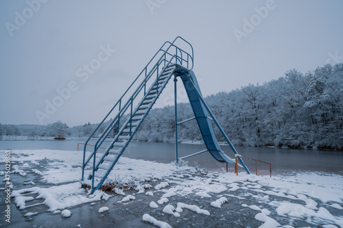 old slide in winter photo